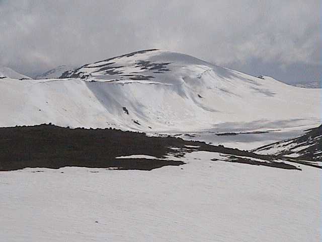Cloud shadows over Mt Kosciuszko and its massive cornice